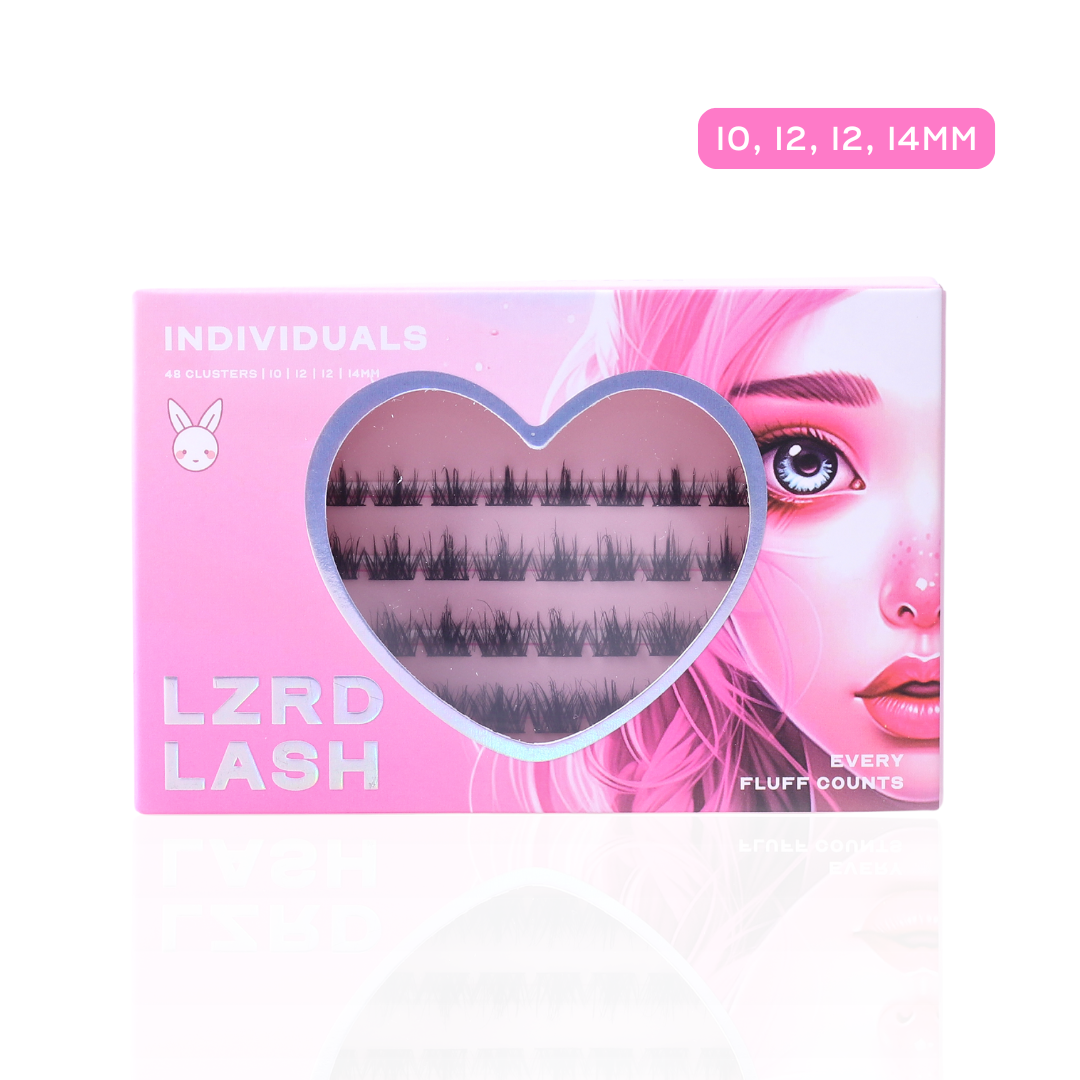 pink packaging for "LZRD LASH" individual eyelash clusters. The packaging features a heart-shaped window displaying the lash clusters inside. The text on the packaging reads "INDIVIDUALS" at the top, followed by "48 CLUSTERS | 10 | 12 | 12 | 14MM." A small bunny icon is placed next to the word "INDIVIDUALS." At the bottom, the product name "LZRD LASH" is written in large silver letters.