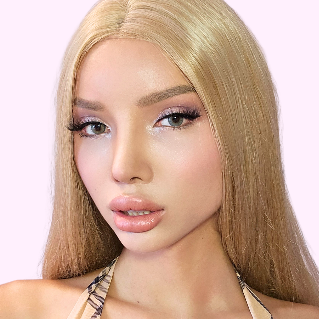 Blonde haired Transwoman wearing false vegan lashes